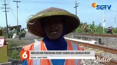 Saat semua orang bersuka cita merayakan Idul Fitri bersama orang-orang tersayang, satu keluarga di Ngawi malah rela tak berlebaran demi bergantian menjaga perlintasan kereta api.