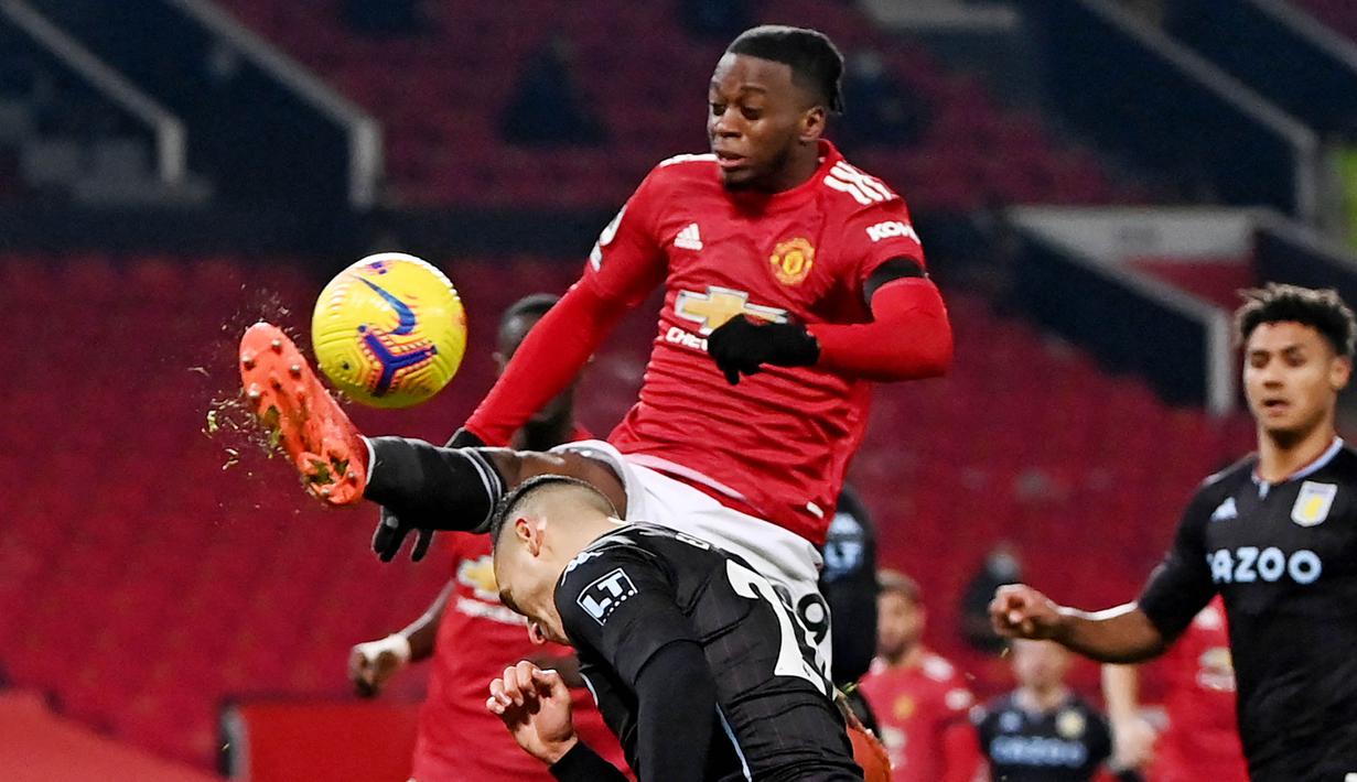 Aaron Wan-Bissaka - Benteng kokoh Manchester United ini adalah momok bagi semua penyerang di Premier League. Meski tangguh dalam duel satu lawan satu namun Wan-Bissaka tidak cukup mahir saat menyerang. (Laurence Griffiths/POOL/AFP)