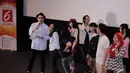 Liputan6.com membagikan doorprize kepada para Cinemaholic jelang menyaksikan film Doraemon di Blitz Megaplex, Jakarta (13/12/2014). (Liputan6.com/Faizal Fanani)