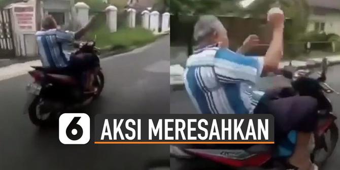 VIDEO: Meresahkan, Pria Paruh Baya Lepas Tangan Saat Kendarai Motor