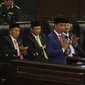 Presiden Joko Widodo atau Jokowi menyampaikan Pidato Kenegaraan pada Sidang Tahunan MPR 2019 di Kompleks Parlemen, Senayan, Jakarta, Jumat (16/8/2019). Jokowi akan menyampaikan pidato dalam tiga sesi dengan tema yang berbeda selama acara berlangsung. (Liputan6.com/Johan Tallo)