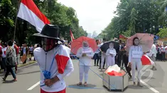 Sejumlah Massa yang tergabung dalam kompak salah satu pendukung Komjen Budi Gunawan melakukan aksi di depan Istana Merdeka, Jakarta, Senin (16/2/2015). (Liputan6.com/Herman Zakharia)