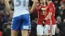 Gelandang MU, Henrikh Mkhitaryan melakukan selebrasi bersama Bastian Schweinsteiger usai mencetak gol Wigan Athletic pada Piala FA di Stadion Old Trafford, Inggris (29/1). MU menang atas Wigan 4-0. (AP Photo/Rui Vieira)
