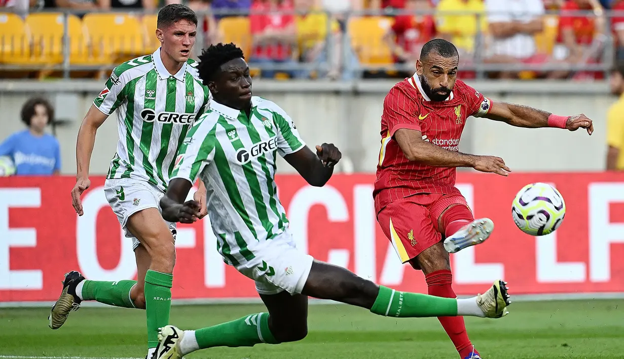 Liverpool mengawali tur pramusim 2024 dengan kemenangan. The Reds berhasil membungkam Real Betis dengan skor 1-0, Sabtu (27/7/2024) pagi WIB. (AFP/Justin Berl)