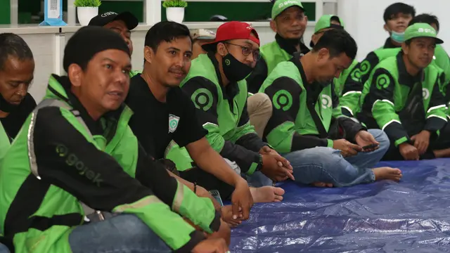 Bakti Sosial Ramadan Bersama Komunitas Mitra Driver Gojek