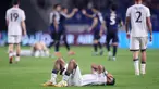 Ekspresi pemain belakang Timnas Indonesia, Yance Sayuri (tengah) usai pertandingan putaran ketiga Kualifikasi Piala Dunia 2026 zona Asia grup C melawan Jepang di Stadion Panasonic Suita, Osaka, Selasa (10/6/2025). (PAUL MILLER/AFP)