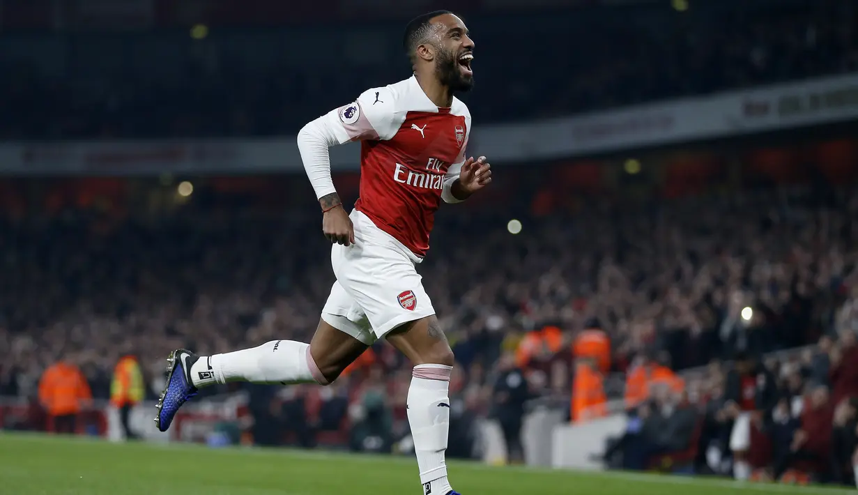 7. Alexandre Lacazette (Arsenal) - 12 gol dan 7 assist (AFP/Ian Kington)