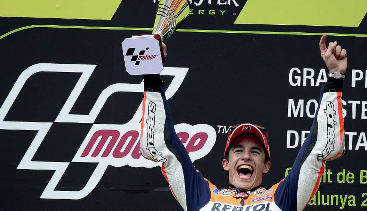 Marc Marquez merayakan kemenangan di Katalunya (JOSEP LAGO / AFP)