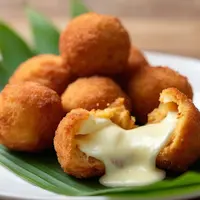 Resep Getuk Keju Mozarella yang Lumer dan Gurih Manis./Copyright depositphotos.com/AI Generator