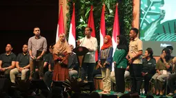 Presiden Joko Widodo memberi sambutan dalam Spirit of Millenials: Green Festival di Jakarta, Kamis (31/1). Acara ini untuk meningkatkan kepedulian milenial terhadap gaya hidup ramah lingkungan, urban farming dan agrikultur. (Liputan6.com/Angga Yuniar)