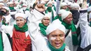 Anggota Laskar Front Pembela Islam (FPI) melakukan konvoi melintas di kawasan Bundaran HI, Jakarta, Rabu (22/5/2019). FPI mengerahkan simpatisannya di Jabodetabek untuk berdemonstrasi terkait hasil rekapitulasi suara Pemilu 2019 di gedung Bawaslu. (Liputan6.com/Immanuel Antonius)