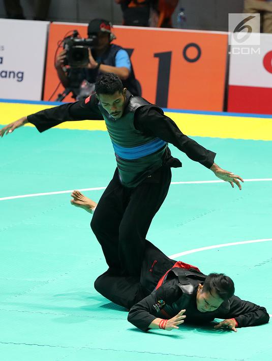 FOTO Pesilat  Komang Harik Menang Telak Atas Timor Leste 