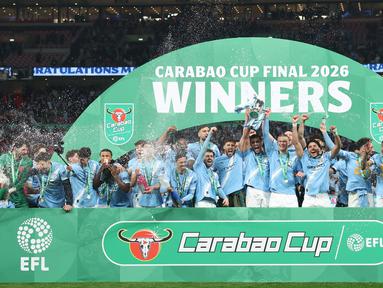Manchester City menaklukkan Arsenal dengan skor 2-0 dalam final Carabao Cup 2025/2026 di Wembley Stadium, Minggu 22 Maret 2026 malam WIB. (AP Photo/Richard Pelham)