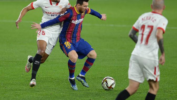 Aksi Lionel Messi saat Barcelona melawan Sevilla di semifinal Copa del Rey (AFP)