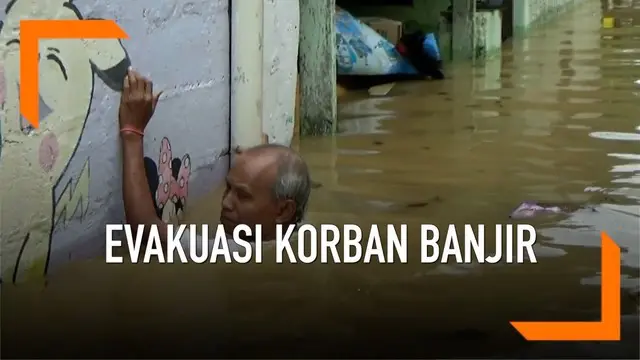 Petugas menggunakan perahu karet melakukan evakuasi terhadap para korban banjir di Bidara Cina, Jakarta. Proses evakuasi berjalan tidak mudah karena air setinggi atap rumah.