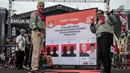 Calon Presiden dan Calon Wakil Presiden nomor urut 3 Ganjar Pranowo dan Mahfud Md saat kampanye akbar pemilu 2024 di Semarang, Jawa Tengah, pada 10 Februari 2024. (JUNI KRISWANTO/AFP)