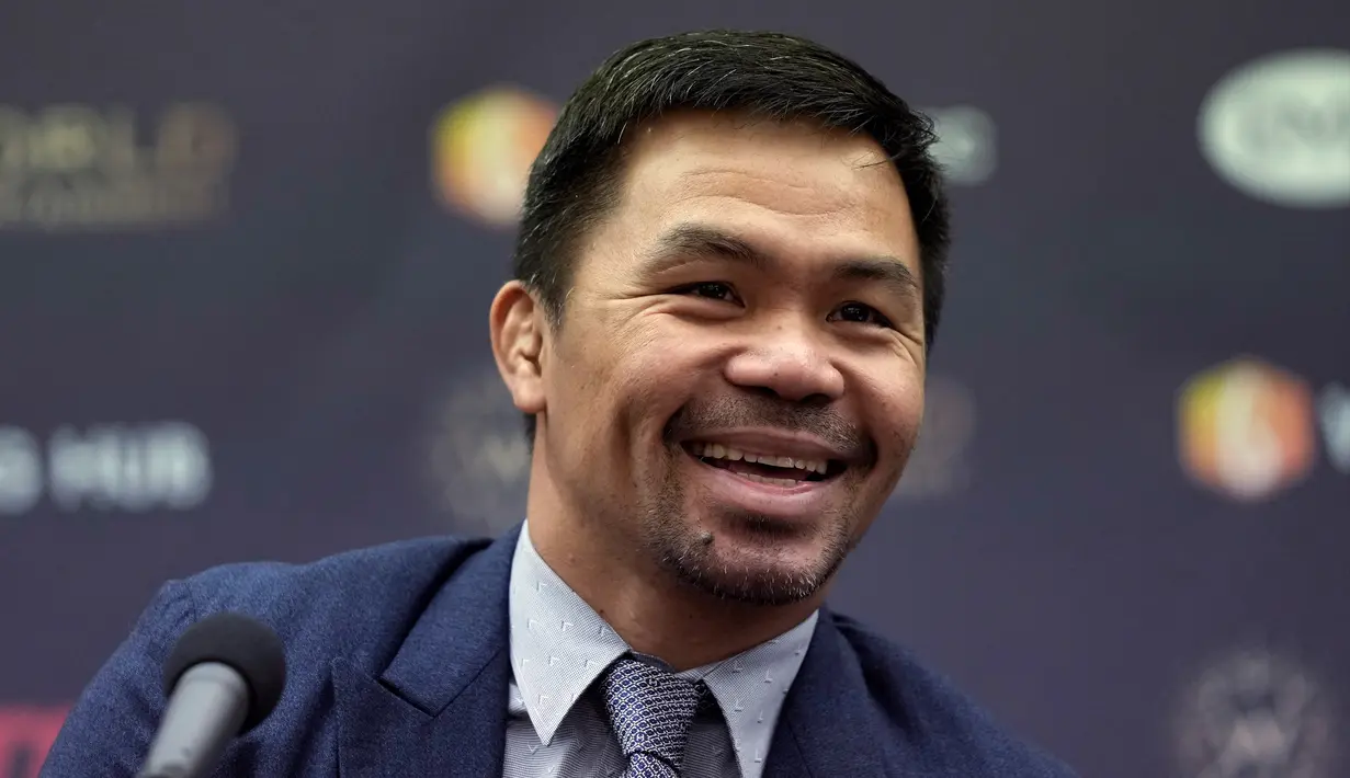 Politisi Filipina dan mantan petinju Manny Pacquiao menghadiri konferensi pers dengan seniman bela diri Korea Selatan D.K. Yoo di Pusat Pers, Seoul, Korea Selatan, Selasa (11/10/2022). Eksibisi mendatang akan dipertandingkan di bawah aturan tinju selama enam ronde kali dua menit. (AP Photo/Ahn Young-joon)