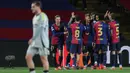 Kemenangan 3-1 atas Benfica memastikan Barcelona lolos ke perempat final Liga Champions 2024/2025 dengan agregat 4-1 usai menang 1-0 di leg pertama. (LLUIS GENE/AFP)