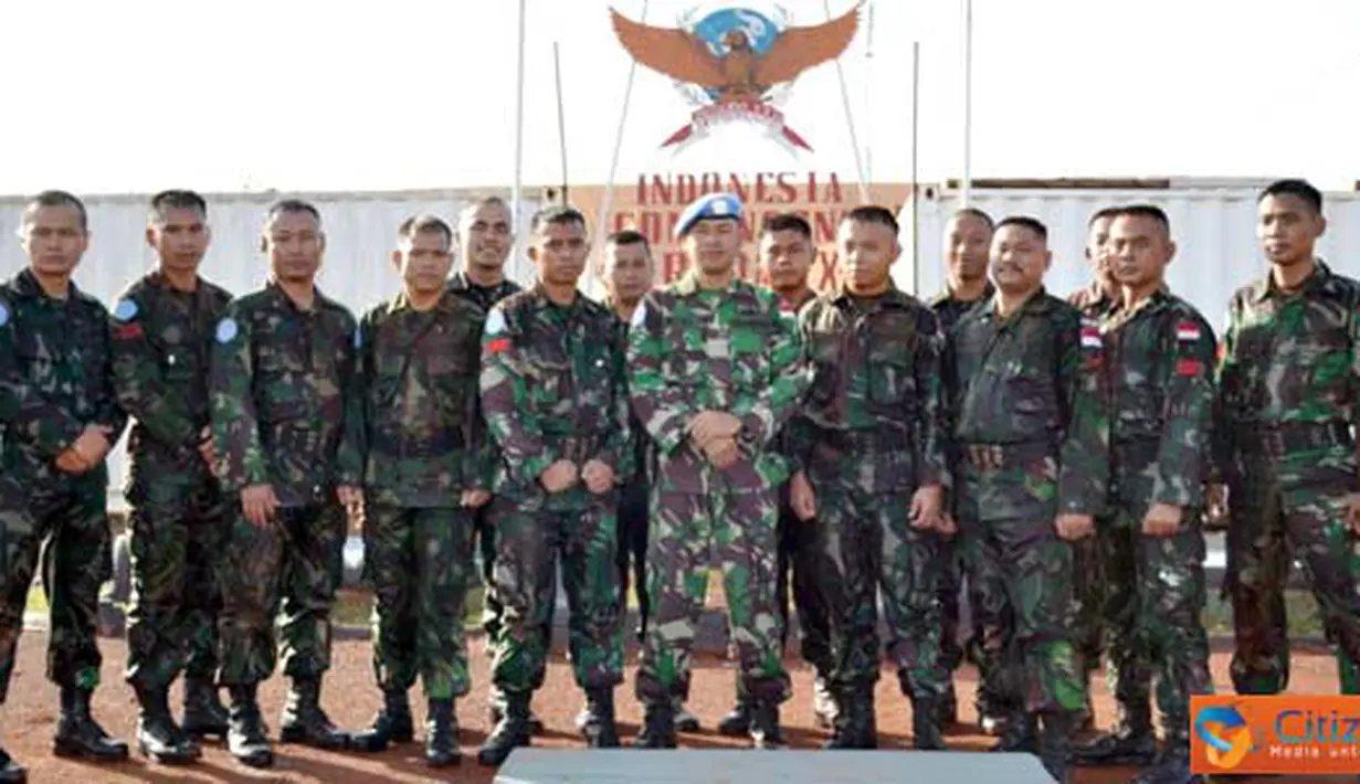 Ciitizen6, Kongo: 21 personil TNI naik pangkat di Lapangan Bumi Cenderawasih Camp, Dungu, Kongo-Afrika Tengah. (Pengirm: Badarudin Bakri Badar)