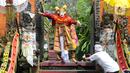 Prosesi Tawur Agung Kesanga di Pura Cinere diikuti ratusan umat Hindu. (merdeka.com/Arie Basuki)