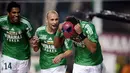 Selebrasi topeng Spiderman acap terlihat saat Auba mencetak gol. Kontribusinya selama 4 tahun hasilkan gelar Piala Liga Prancis pada tahun 2012. (AFP/Jeff Pachoud)