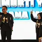 Cagub DKI Jakarta nomor 1 Agus Harimurti Yudhoyono-Sylviana menyapa pendukungnya saat debat kedua Cagub DKI-Jakarta, Jumat (27/1). (Liputan6.com/Faizal Fanani)