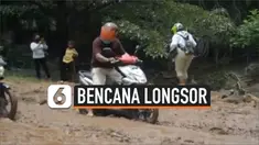 Bencana longsor memutus akses jalan penghubung antara Indonesia dan Timor Leste. Hujan deras membuat tanah longsor dan warga terpaksa harus mencari jalur lain.
