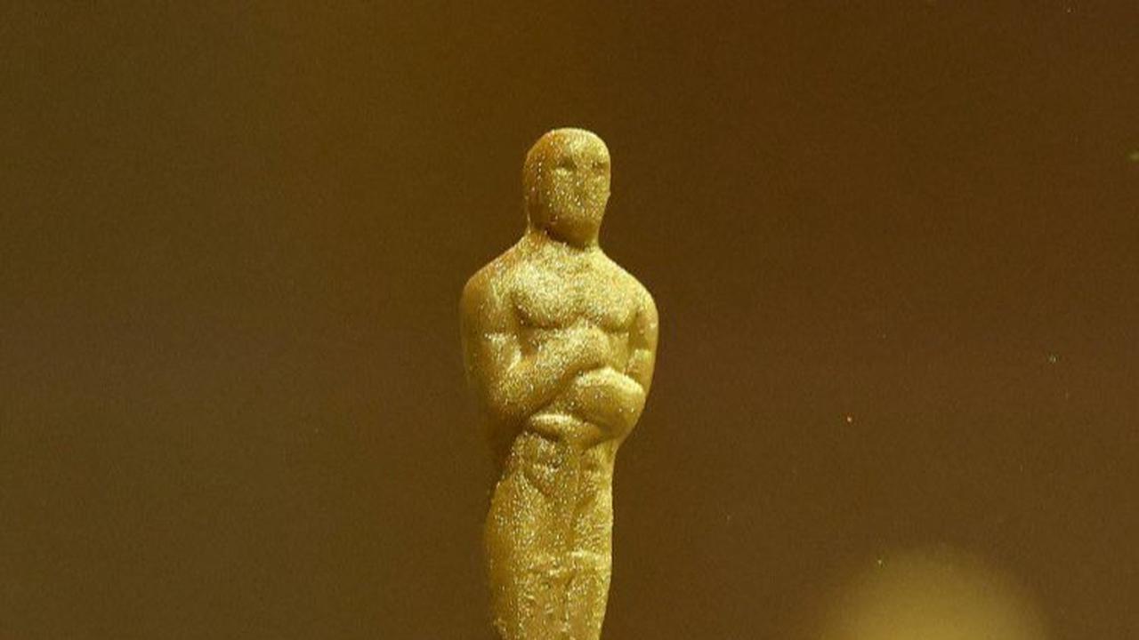 Dalam menunya, Wolfgang Puck kembali menghadirkan cokelat berbentuk Piala Oscar. Yang istimewa, cokelat ini dilapisi emas 24 karat.&nbsp;REUTERS/Mario Anzuoni