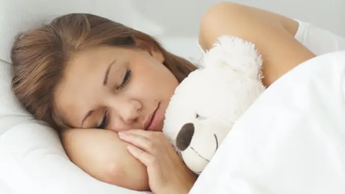 Posisi tidur terbaik saat haid./Copyright shutterstock.com