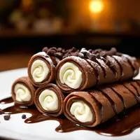 Resep Chocolate Cookie Cream Crepe Rolls./Copyright depositphotos.com/AI Generator