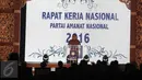 Menko Polhukam Luhut Pandjaitan memberikan pidato sambutan dalam pembukaan Rakernas dan Silaturahmi Nasional (Silatnas) PAN di JIEXPO Kemayoran, Jakarta, Minggu (29/5). Luhut hadir menggantikan Presiden Joko Widodo (Jokowi). (Liputan6.com/Faizal Fanani)