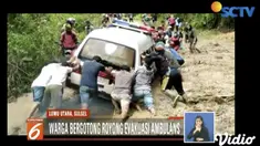 Warga Luwu Utara, Sulawesi Selatan, membantu perempuan hamil yang terjebak lumpur saat dalam perjalanan melahirkan ke rumah sakit
