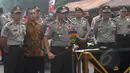 Kapolda Metro Jaya Unggung Cahyono (tengah) saat rilis kasus  pencurian dengan kekerasan (curas), pencurian dengan keberatan (curat), dan pencurian kendaraan bermotor (curanmor) di Mapolda Metro Jaya, Jakarta, Jumat (27/2). (Liputan6.com/Johan Tallo)