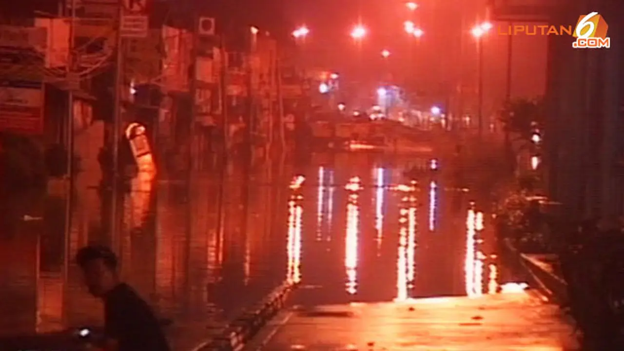 banjir-rendam-jalan-140120-a.jpg