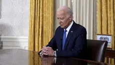 Presiden AS Joe Biden berbicara dalam pidato nasionalnya tentang keputusannya untuk tidak mencalonkan diri kembali di Oval Office Gedung Putih di Washington, DC, Rabu (24/7/2024) Waktu setempat. (Evan Vucci / POOL / AFP)