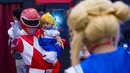 Pengunjung  mengenakan kostum Power Rangers merah di Festival Pop Culture Popcon Asia 2018 di BSD, Tangerang Selatan, Sabtu (22/9). (AFP PHOTO / BAY ISMOYO)