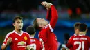 Penyerang MU, Wayne Rooney melakukan selebrasi setelah mencetak gol ke gawang Club Brugge saat pertandingan Play – Off  leg kedua Liga Champion di Stadion Jan Breydel, Bruges, Belgia, Rabu (26/8/2015). MU menang dengan skor 4 – 0. (Reuters/Carl Recine)
