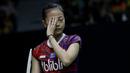 Tunggal Putri Indonesia, Fitriani, tampak lesu usai ditaklukkan wakil China, Han Yue, pada laga Indonesia Masters 2020 di Istora, Jakarta, Rabu (15/1/2020). Fitriani kalah dengan skor 6-21 dan 17-21. (Bola.com/M Iqbal Ichsan)