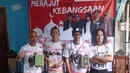 Personel band Slank berpose usai menggelar jumpa pers di Markas Slank, Jakarta, Selasa (05/09). Dalam jumpa pers tersebut Slank memberi keterangan terkait tur 4 kota di Indonesia yang akan digelar. (Liputan6.com/Herman Zakharia)