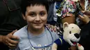 Carlos Santamaria Diaz (12) selama acara pers di Universitas Otonomi Nasional Meksiko (UNAM) di Mexico City, 3 Agustus 2018. Carlos diterima sebagai mahasiswa di UNAM untuk program gelar sarjana dalam bidang fiiska biomedis. (AP/Marco Ugarte)