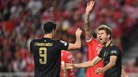 Bayern Munchen menang 4-0 atas Benfica pada laga ketiga Grup F Liga Champions di Estadio da Luz, Kamis (21/10/2021) dini hari WIB. (AFP/PATRICIA DE MELO MOREIRA)