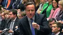 Perdana Menteri Inggris, David Cameron berbicara saat pemungutan pemerintah Inggris pada aksi militer terhadap Negara Islam (IS) Suriah di London (2/11). Pemungutan suara digelar usai debat selama lebih dari 10 jam. (AFP PHOTO/PRU)