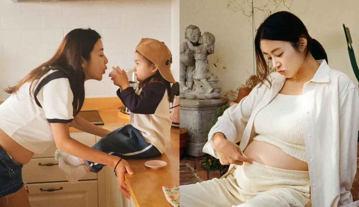 Setelah menjadi ibu, Kang Sora tidak pernah mengungkap wajah anak pertamanya. Namun di maternity shoot anak kedua, Kang Sora tak ragu menunjukkan keintiman bersama anak pertamanya. [@reveramess_]