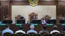 Dalam persidangan, Jaksa Penuntut Umum (JPU) menyatakan Toto Nugroho, Hasto Wibowo, Dwi Sudarsono, Arief Sukmara, dan Indra Putra terbukti secara sah dan meyakinkan melakukan tindak pidana korupsi secara bersama-sama. Tampak dalam foto, lima terdakwa kasus dugaan korupsi tata kelola minyak mentah dan produk kilang pada PT Pertamina Subholding dan Kontraktor Kontrak Kerja Sama (KKKS) tahun 2018-2023 saat menjalani sidang tuntutan di Pengadilan Tindak Pidana Korupsi (Tipikor), Jakarta, Rabu (22/4/2026). (merdeka.com/Arie Basuki)