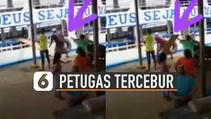 Lantaran salah posisi saat menarik, bagian pantat terbentur papan hingga ia tercebur.