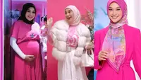 Turut ramaikan &lsquo;demam&rsquo; Barbie, Irish Bella tampil mengenakan long sleeve pink yang serasi dengan kerudungnya. Ia memadukannya dengan jaket berbulu putih, rok ruffle, dan stiletto heels-nya. [Instagram/_irishbella_].