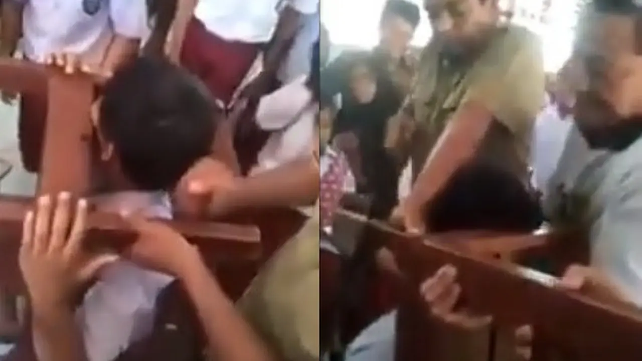 bocah SD tersangkut kursi