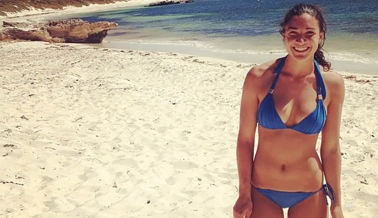 Michelle Jenneke dikenal dengan pemanasan seksi yang kerap dilakukannya sebelum berlari. (Bola.com/Instagram/Michelle Jenneke)
