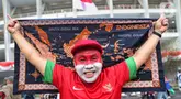 Pendukung timnas Indonesia saat berada di area Stadion Utama Gelora Bung Karno (SUGBK), Jakarta, Selasa (10/9/2024). (Liputan6.com/Angga Yuniar)