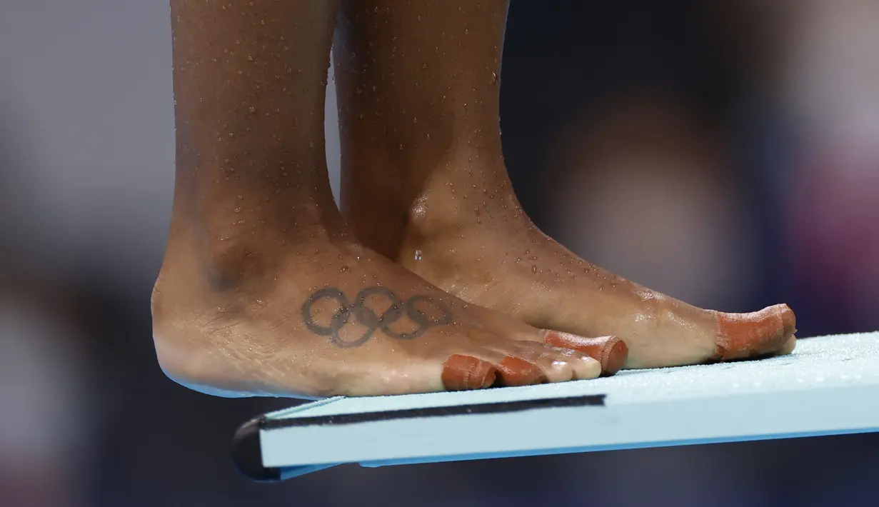 Jennifer Abel - Atlet asal Kanada ini memiliki tato cincin Olimpiade bagian kakinya. Dia pernah menyabet medali perunggu di Olimpiade London 2012. (Foto:AFP/Odd Andersen)